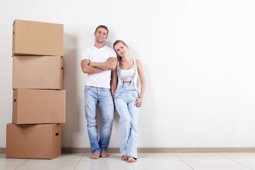 Movers preparing equipment for a safe house move