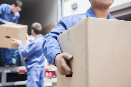 Customer complaint being recorded during a professional moving service