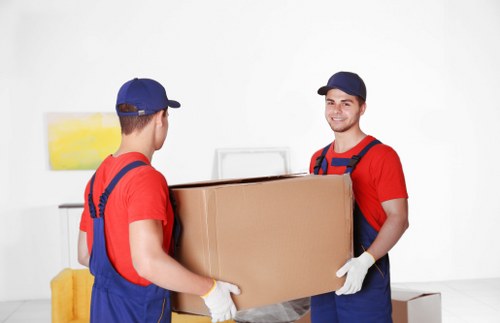 Professional packing team organising boxes in a Hampstead home