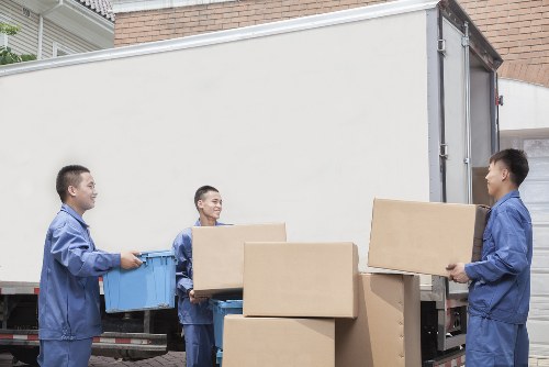 Removal team preparing household items for a move in Hampstead