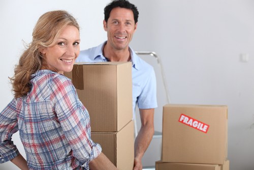 Packed office equipment and furniture prepared for a business move