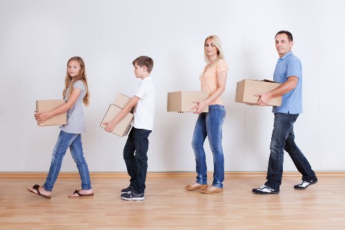 Packing boxes and furniture for a move in Hampstead
