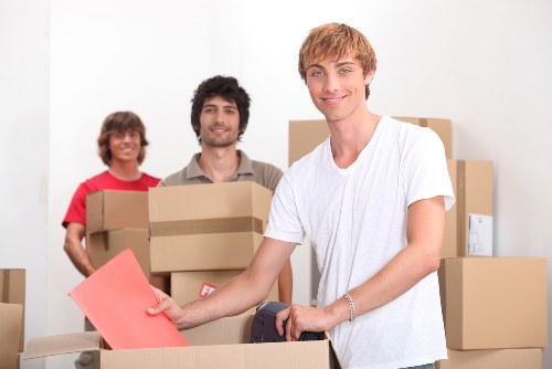 Unloading office furniture and equipment at a new commercial premises