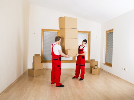 Local movers in Hampstead handling boxes and furniture carefully